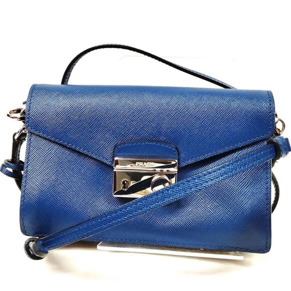 Prada Handbags - Authentic PRADA Blue Saffiano Lux Leather 2way Sound Flap Mini Crossbody Bag